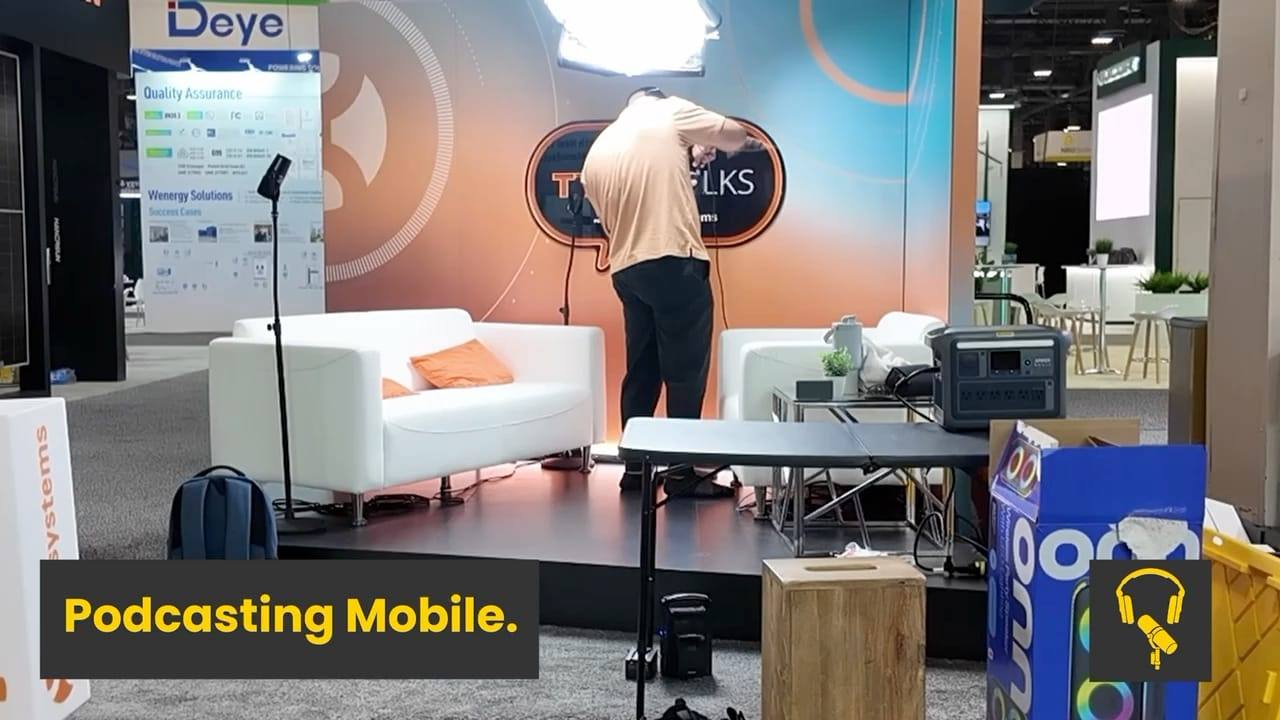 Setting up the Teddy Talks booth at RE+ before the show floor opens